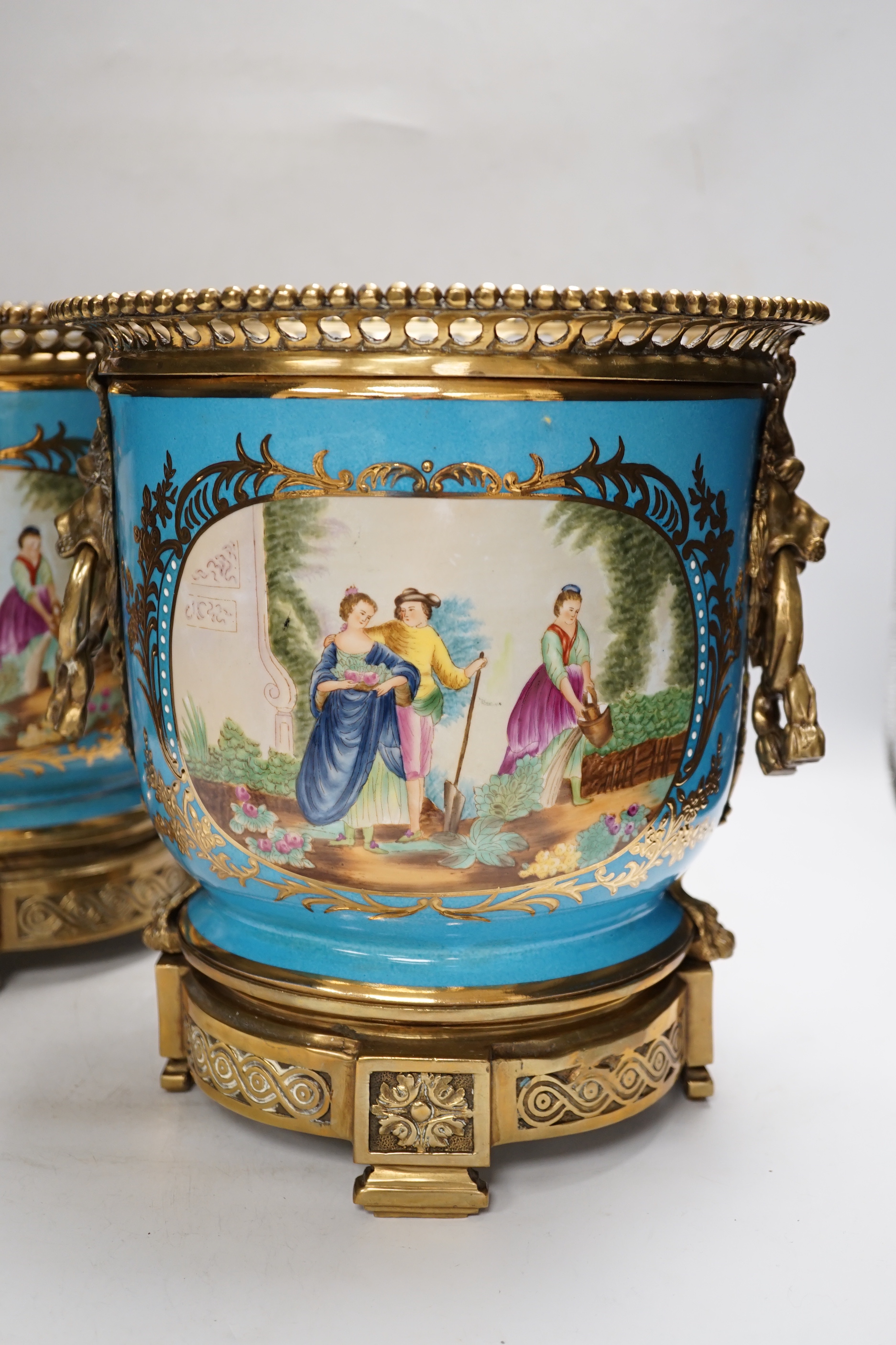 A Delft tobacco jar hand-painted with two figures, 28cm high